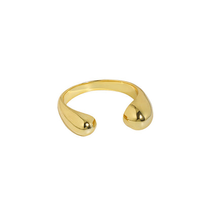 Twin Teardrop Open Ring in 925 sterling silver. Two rounded teardrop ends curve towards each other in an open band.