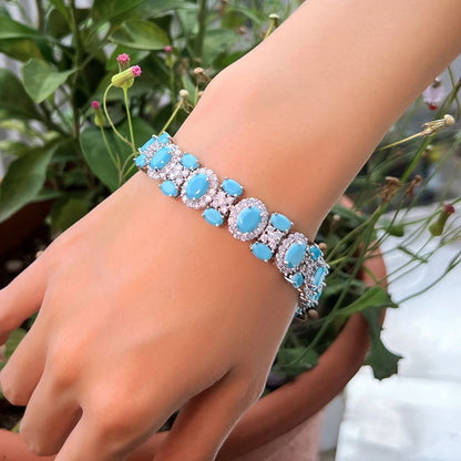 Close up of the turquoise blue oval cubic zirconia stones