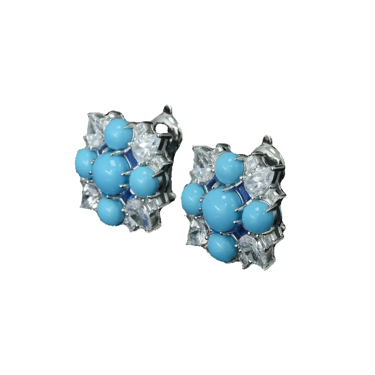 Close up of turquoise and 5A CZ geometric studs