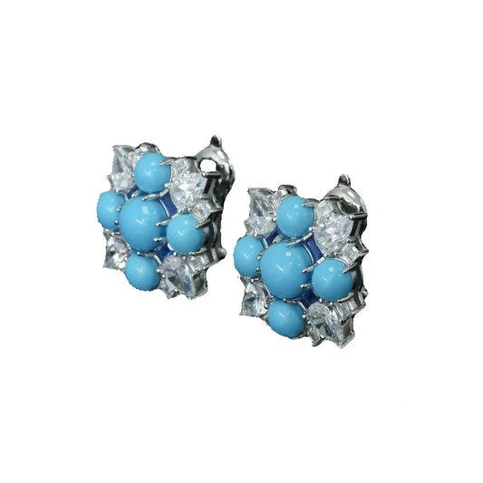 Close up of turquoise and 5A CZ geometric studs