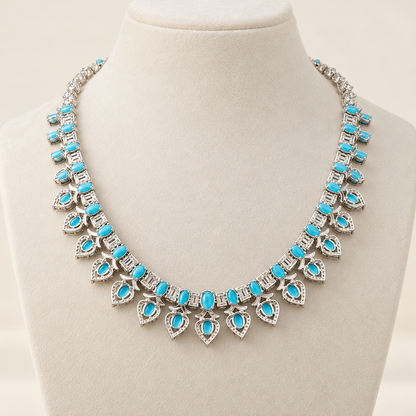 Reverse view of Turquoise Geometric Pendant Necklace showing the sterling silver setting and turquoise drop details
